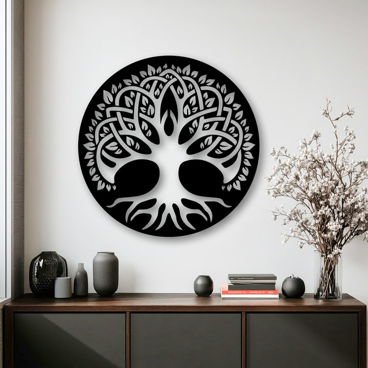 The negative space forms an intricate white Celtic Tree of Life within the circular unique metal wall art, creating a striking visual.
