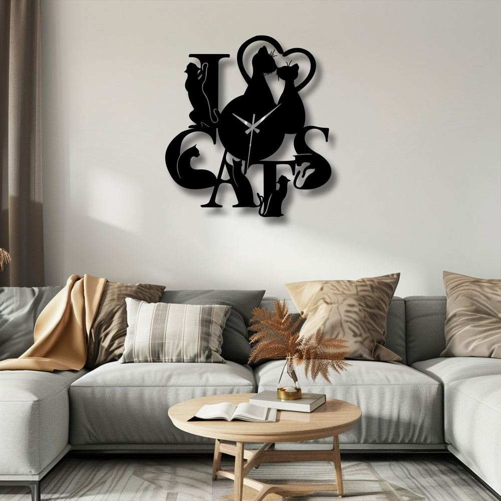 The striking black Love Cats Metal Wall Clock creates a bold color contrast against the crisp white wall, a distinctive metal art for wall.