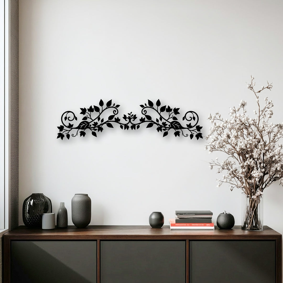 Graceful tendrils and swirling leaves create a flowing sense of movement in this elegant floral vine metal decoration wall art piece.