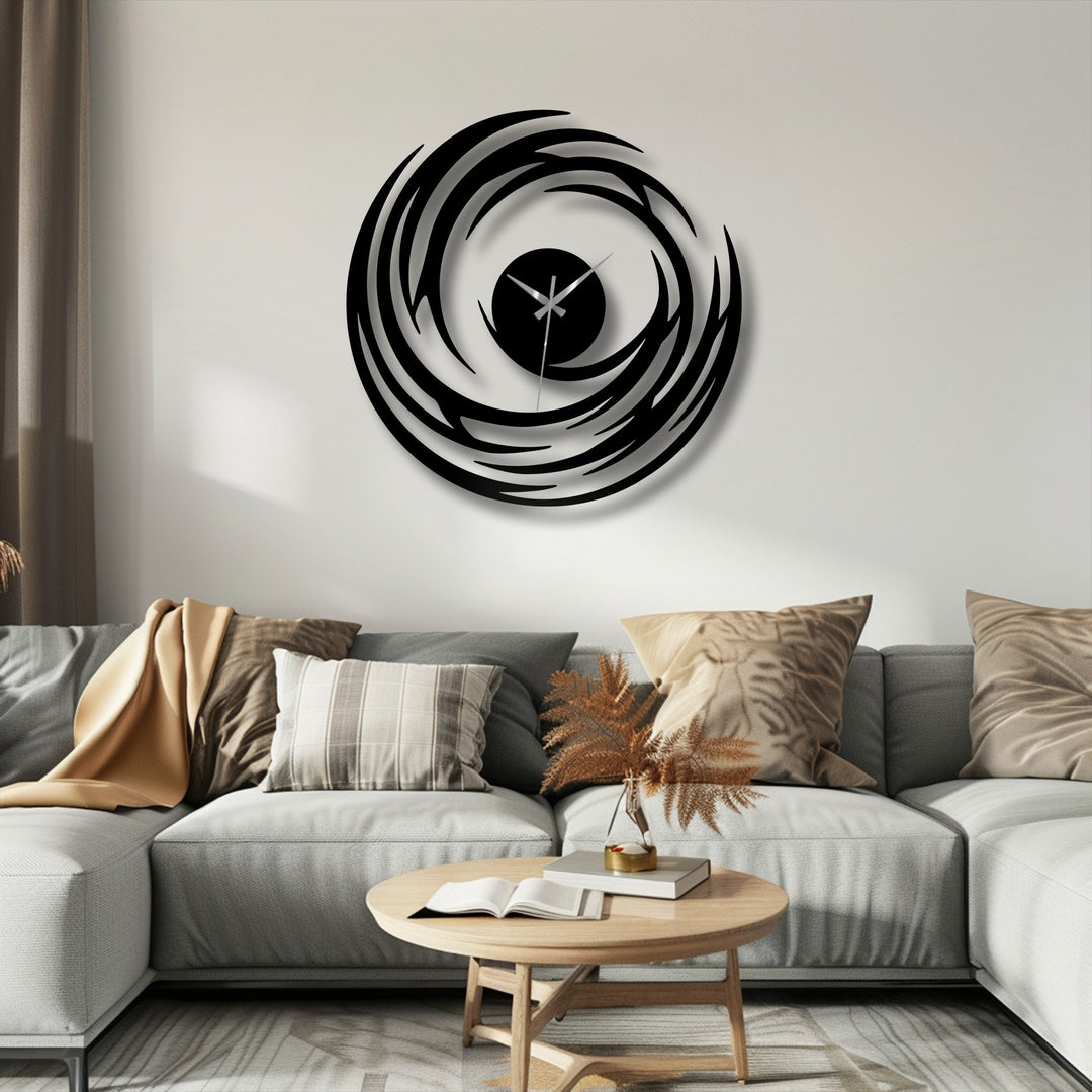 Gently draped fabric offers the softest contrast to the abstract spiral metal art for wall clock, accentuating the modern swirl design in this living room setting.