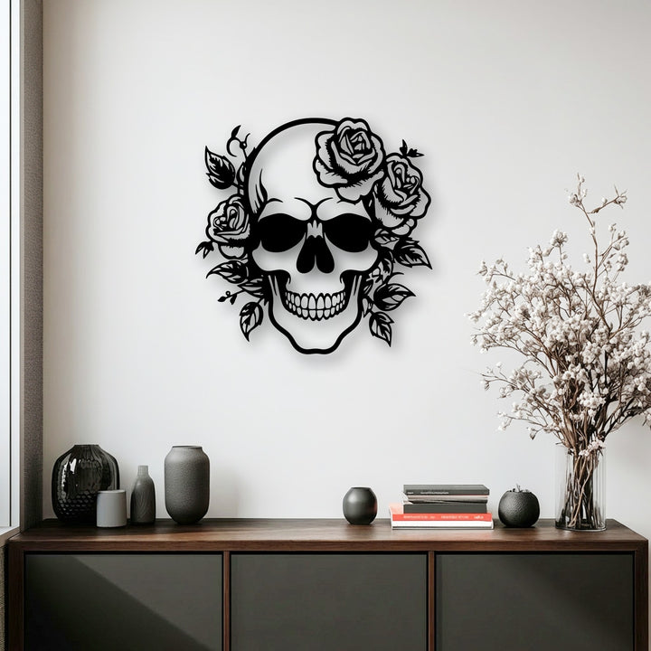 Pristine white wall showcases a captivating black floral skull decoration wall art, complemented by dark vases on a rich wooden console.