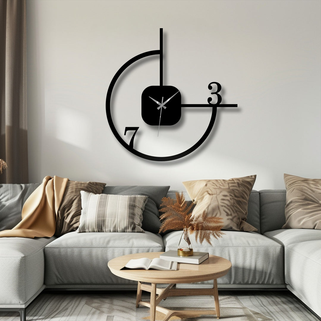 Organic forms in the minimalist geometric metal wall clock create a striking contrast, highlighting its unique metal wall art design as a modern abstract circle decor.