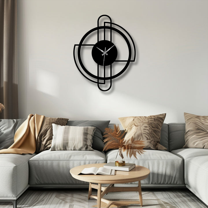 Foreground focus on the minimalist line design and black finish of the modern circle frame metal wall clock, enhancing this piece of unique metal wall decor.
