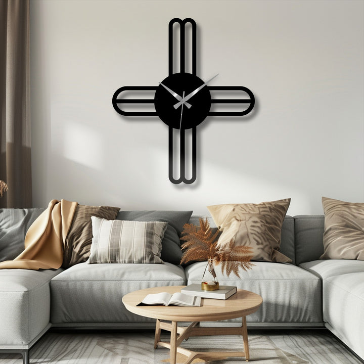 Layered shadows enhance the depth of this modern cross line minimalist metal wall clock, creating a dimensional decorative metal art piece on the wall.