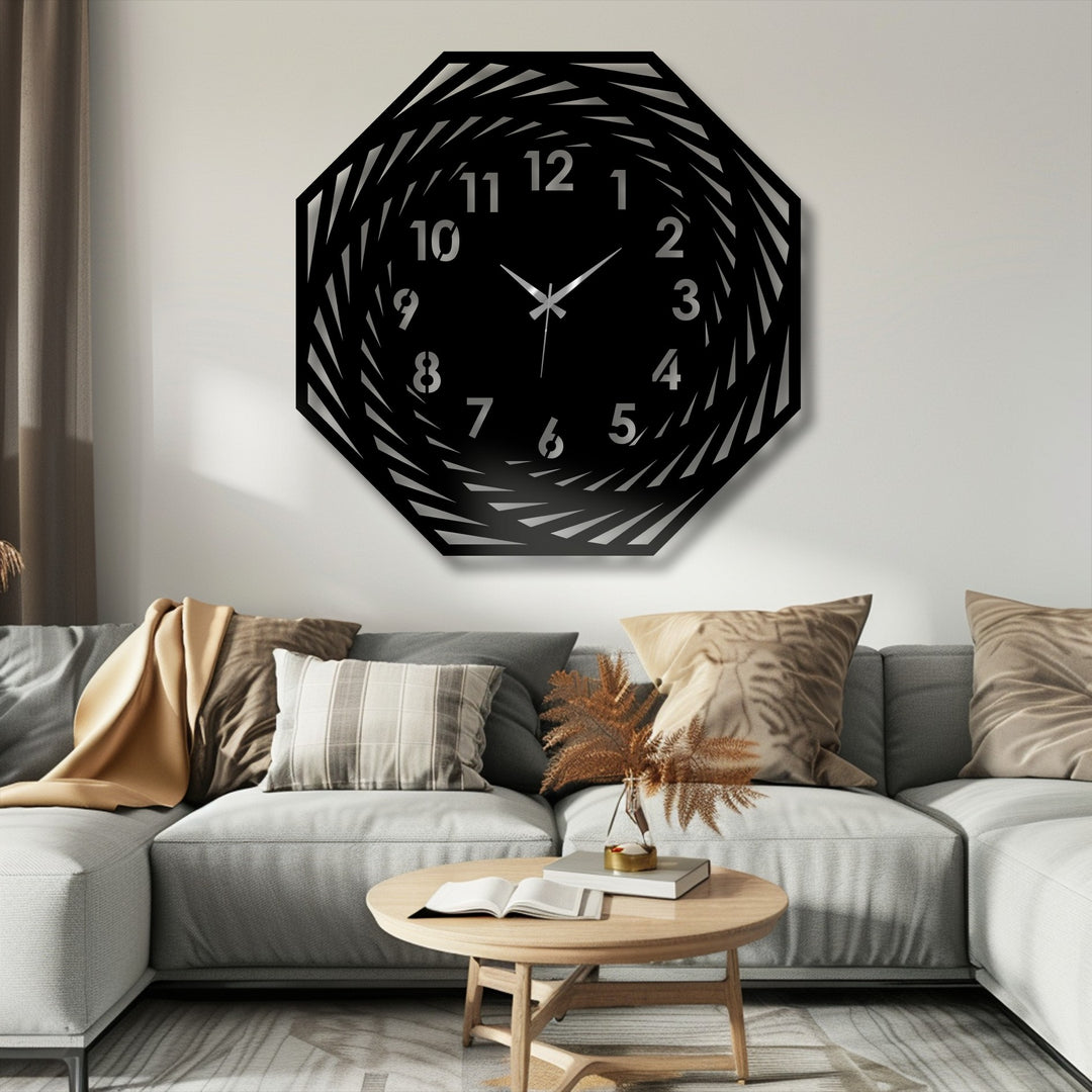 Subtle light and shadow accentuate the depth of this decorative metal art wall clock's spiral geometric design, creating a modern and eye-catching timepiece.