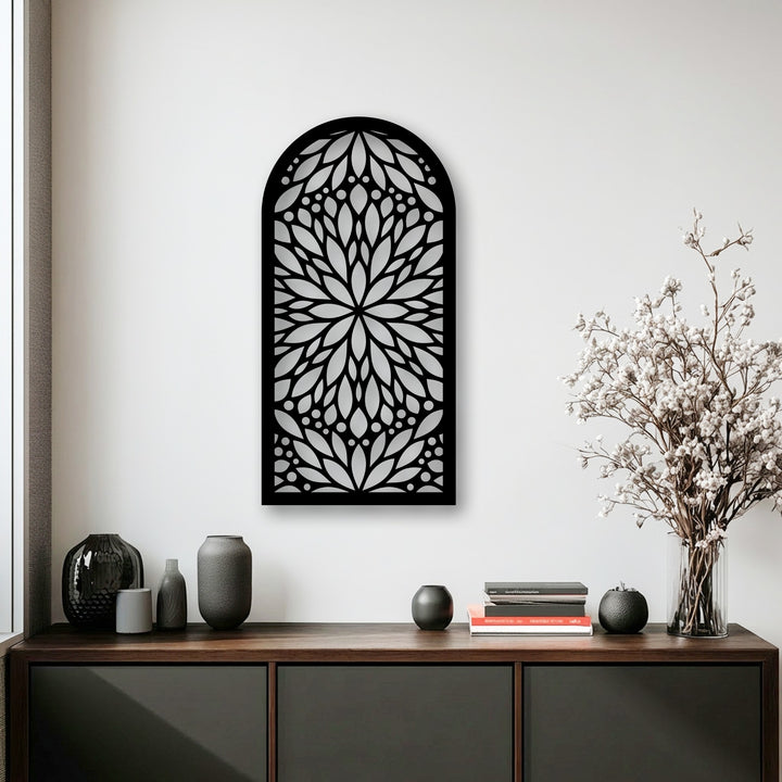 Crisp white walls elegantly display a black mandala floral arch metal wall decor, featuring intricate leaf and dot patterns.