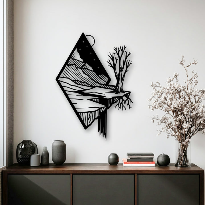 The intricate negative space outlines a unique metal wall art depicting a floating mountain landscape with a tree and cascading river.