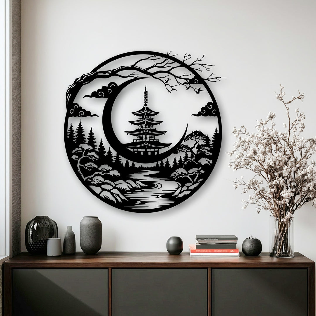 The realistic detail of this decorative metal art captures a serene Japanese pagoda and crescent moon landscape, with intricate trees and clouds.