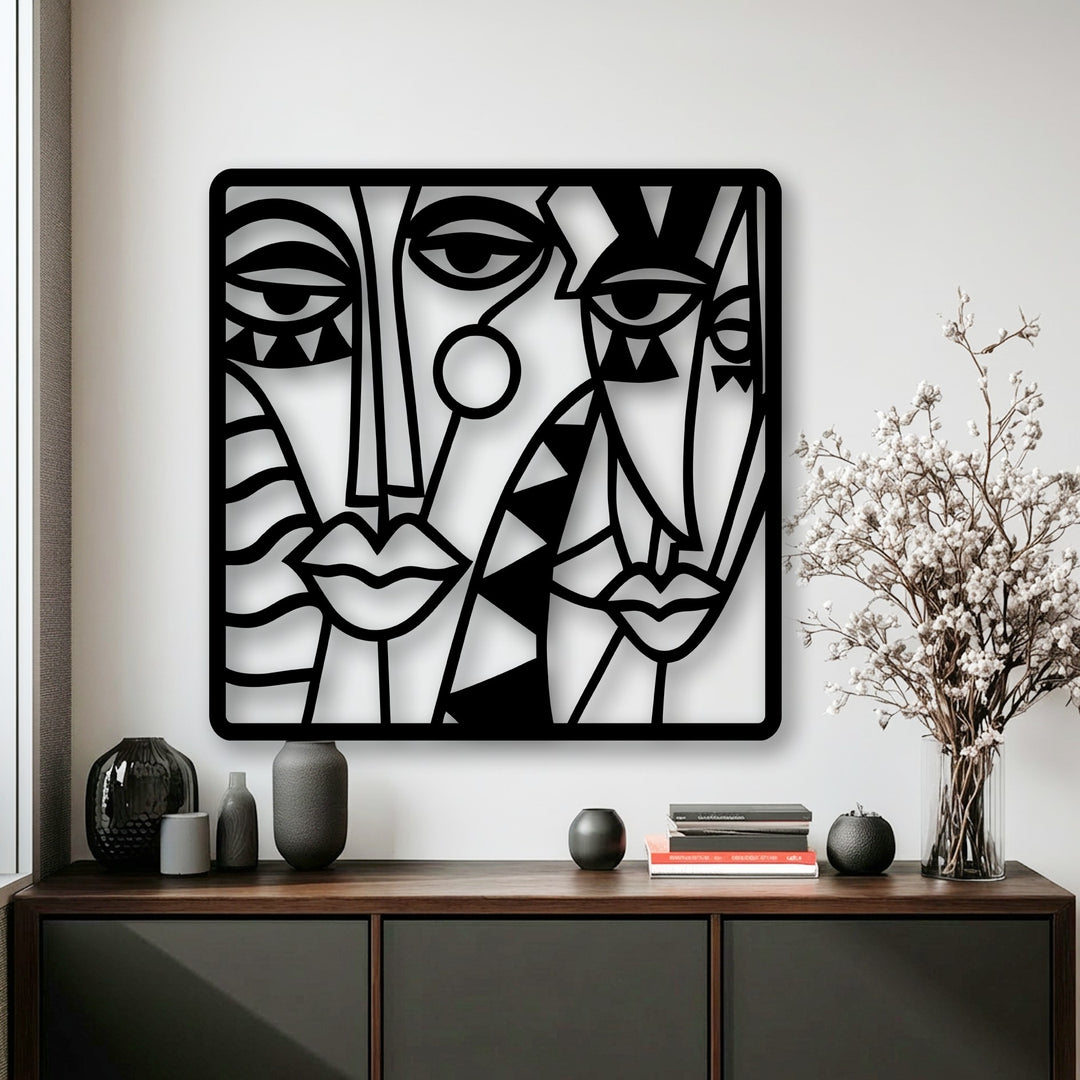 The realistic detail of this cubist metal art for wall reveals precisely cut abstract faces with intricate geometric patterns.