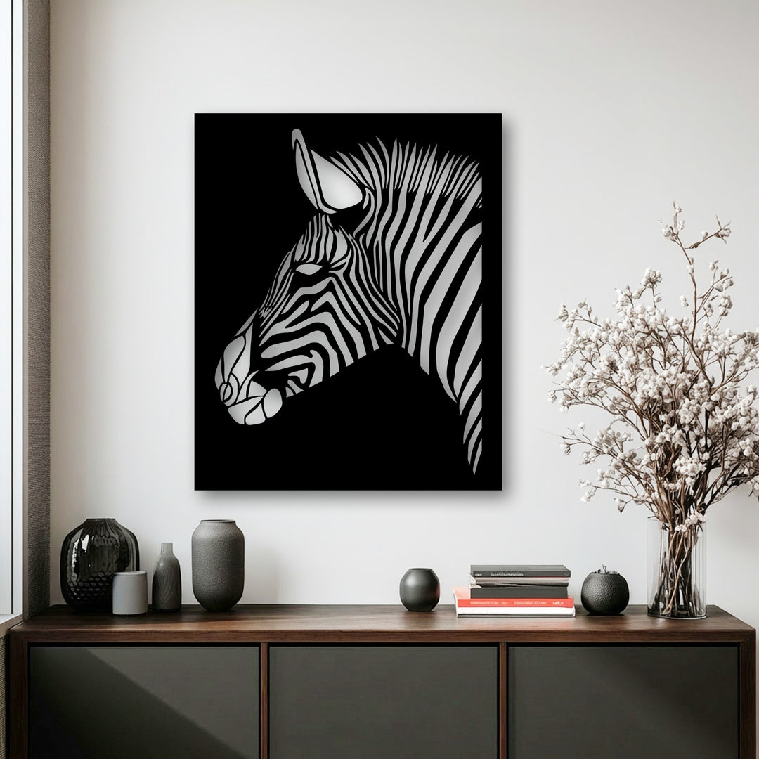 Dominantly black metal art for wall showcases a modern, abstract geometric zebra head profile with elegant white stripes.