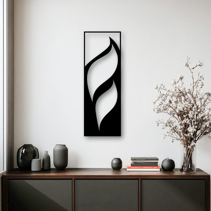 The minimalist vertical flowing leaves metal wall decor features striking depth and layers, casting subtle shadows that enhance its elegant design.
