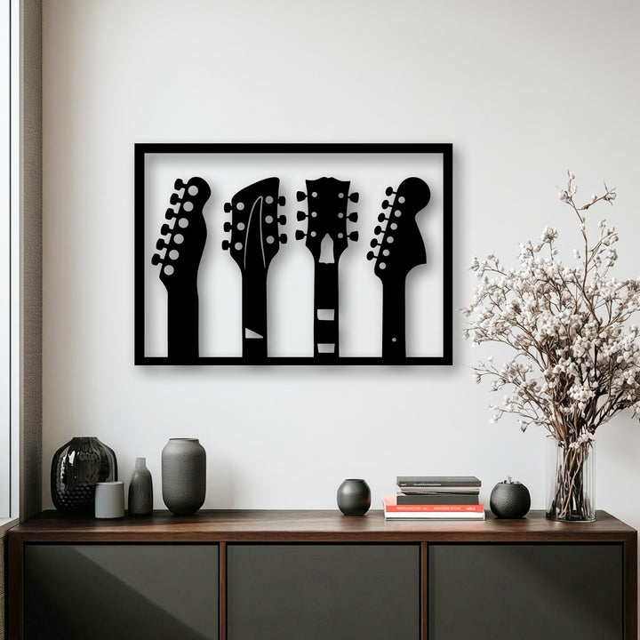 Geometric shapes define the distinct outlines of four guitar headstock silhouettes featured in this modern metal art for wall.