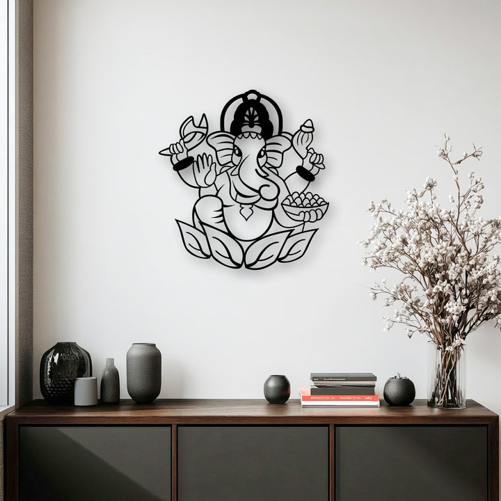 Abstract and striking, this metal artwork depicts the spiritual Ganesha elephant deity seated on a lotus, offering a profound decor.
