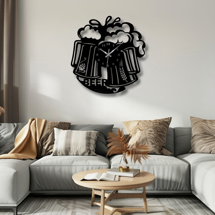 Limited color saturation highlights the black metal art for wall beer mug clock, featuring a frothy beverage design for a pub-style aesthetic.