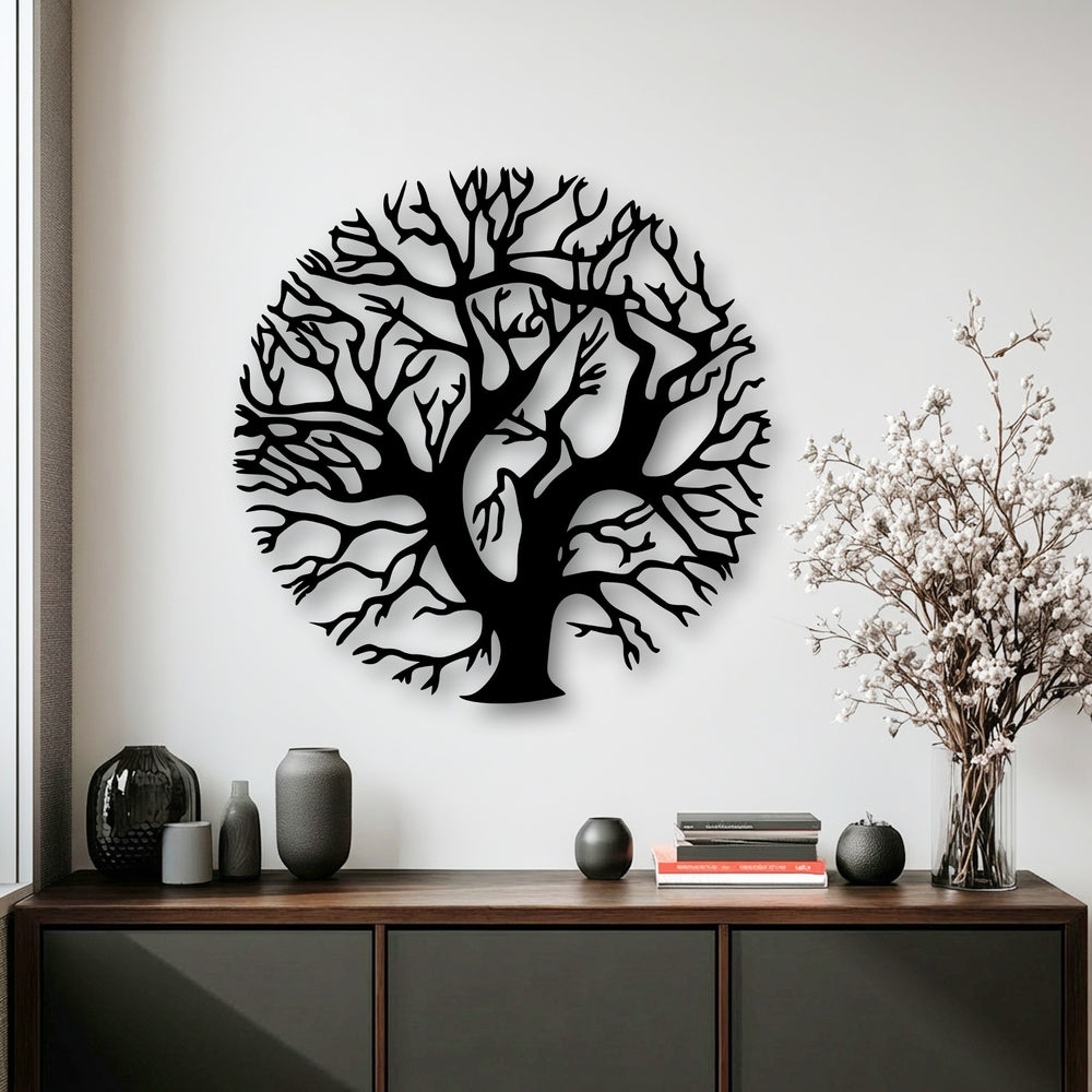 Focusing on the intricate black Tree of Life, a round nature silhouette of unique metal wall art elegantly adorns the white wall.