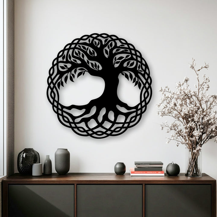 The subtle interplay of light and shadow accentuates the intricate dark metal Tree of Life circle decoration wall art, adding depth to the room.
