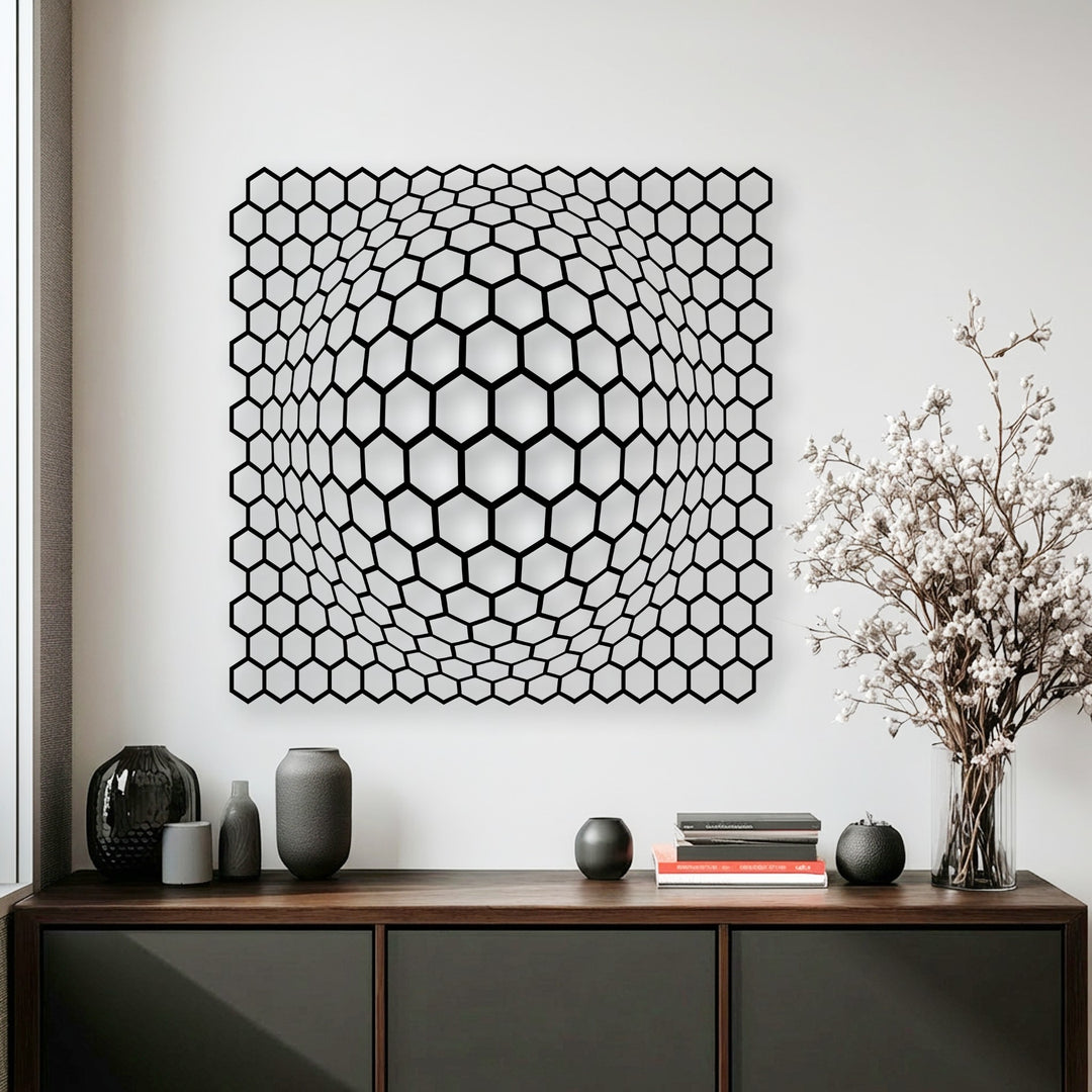 The intriguing and modern mood is set by the geometric hexagon depth illusion metal wall decor, creating a sophisticated focal point.