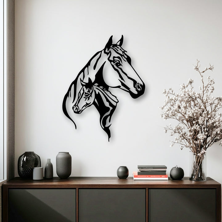 The captivating focal point is an elegant dual horse head silhouette, meticulously crafted as striking metal artwork against a bright white wall.