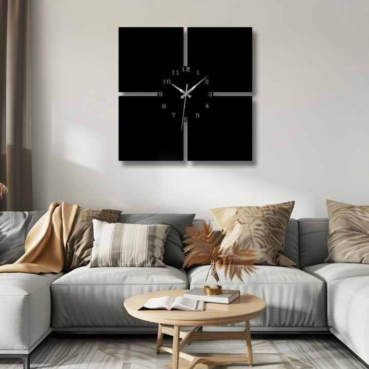 The soft interplay of light and shadow highlights a striking minimal 4-piece metal art for wall clock, enhancing its modern design above a sofa.