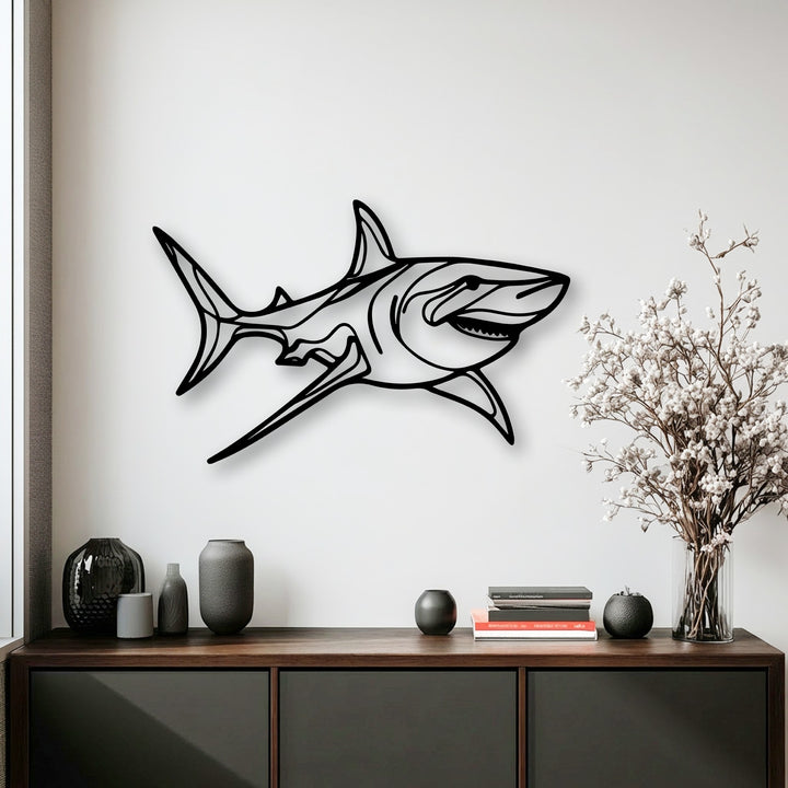 The stillness of the dynamic shark metal art for wall, a frozen ocean predator, provides calm decor above a dark cabinet.