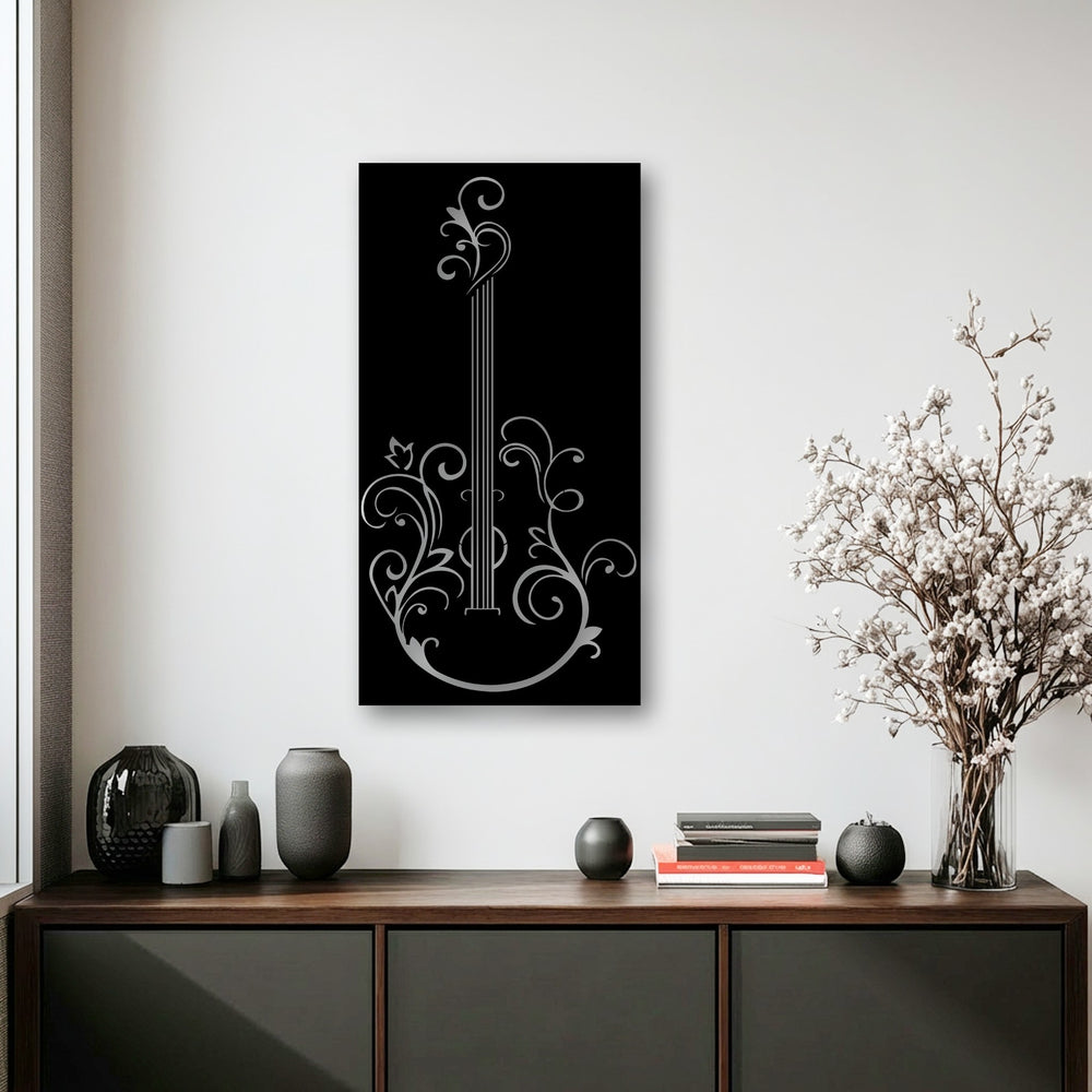 The brightest area, a pristine white wall, beautifully displays elegant guitar silhouette metal artwork with a musical floral design.