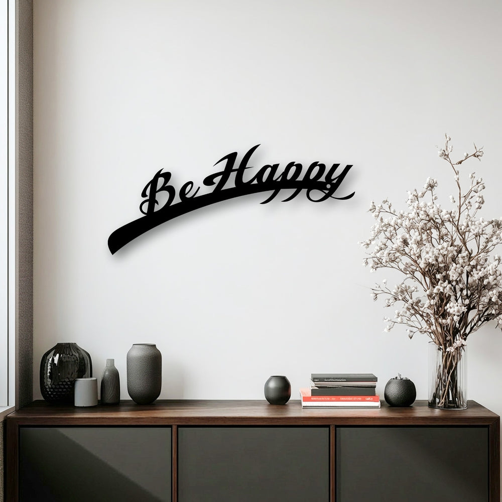 Flowing script and delicate, organic branches of a white flower arrangement complement the elegant Be Happy metal wall decor.