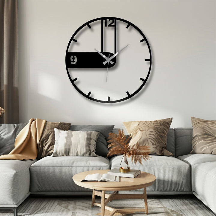 The darkest area highlights the bold contrast of this asymmetrical metal artwork wall clock, showcasing its modern design with a focus on time.
