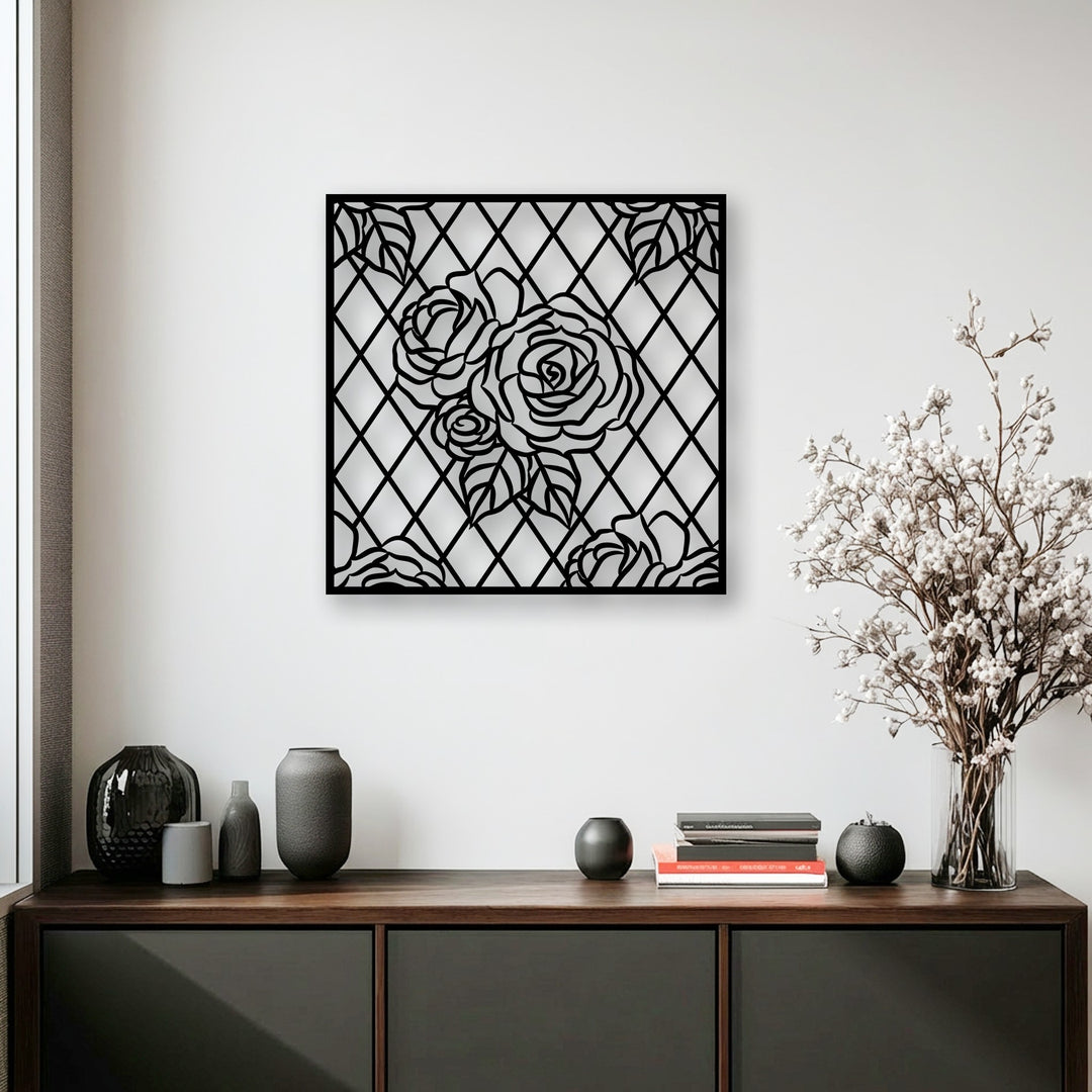 A striking black rose lattice unique metal wall art piece, featuring intricate floral geometric patterns, prominently displayed on a bright wall.