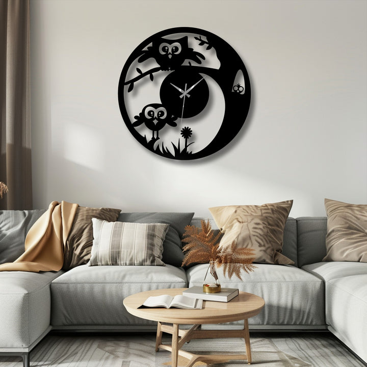 A playful mood emanates from this decorative metal art of a cute owl clock, adding charm to any room with its nature-inspired design.