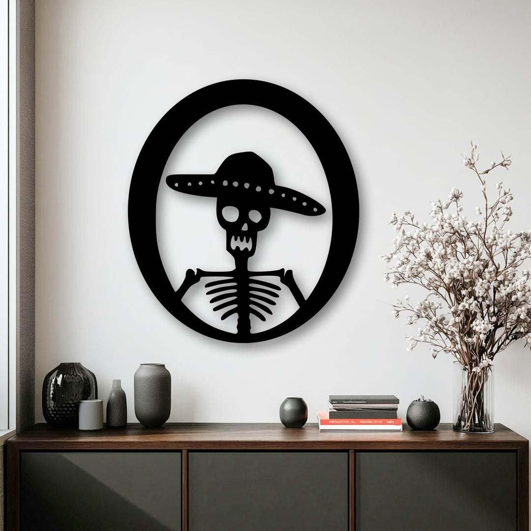 The organic forms of the stylized sombrero skeleton metal decoration wall art and the wispy dried flowers add natural elegance to the room.