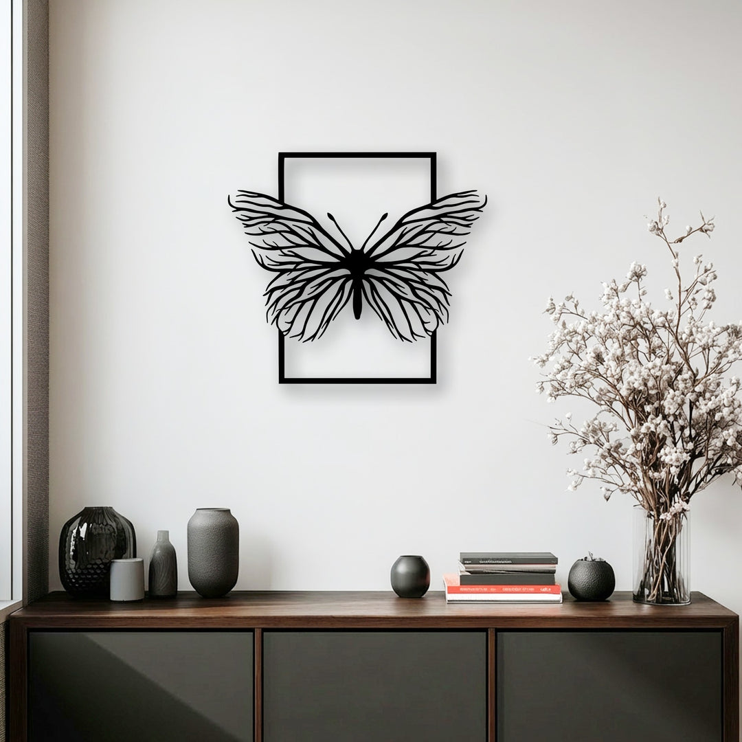 The sleek matte black finish of the ethereal butterfly metal art for wall creates an elegant nature silhouette.