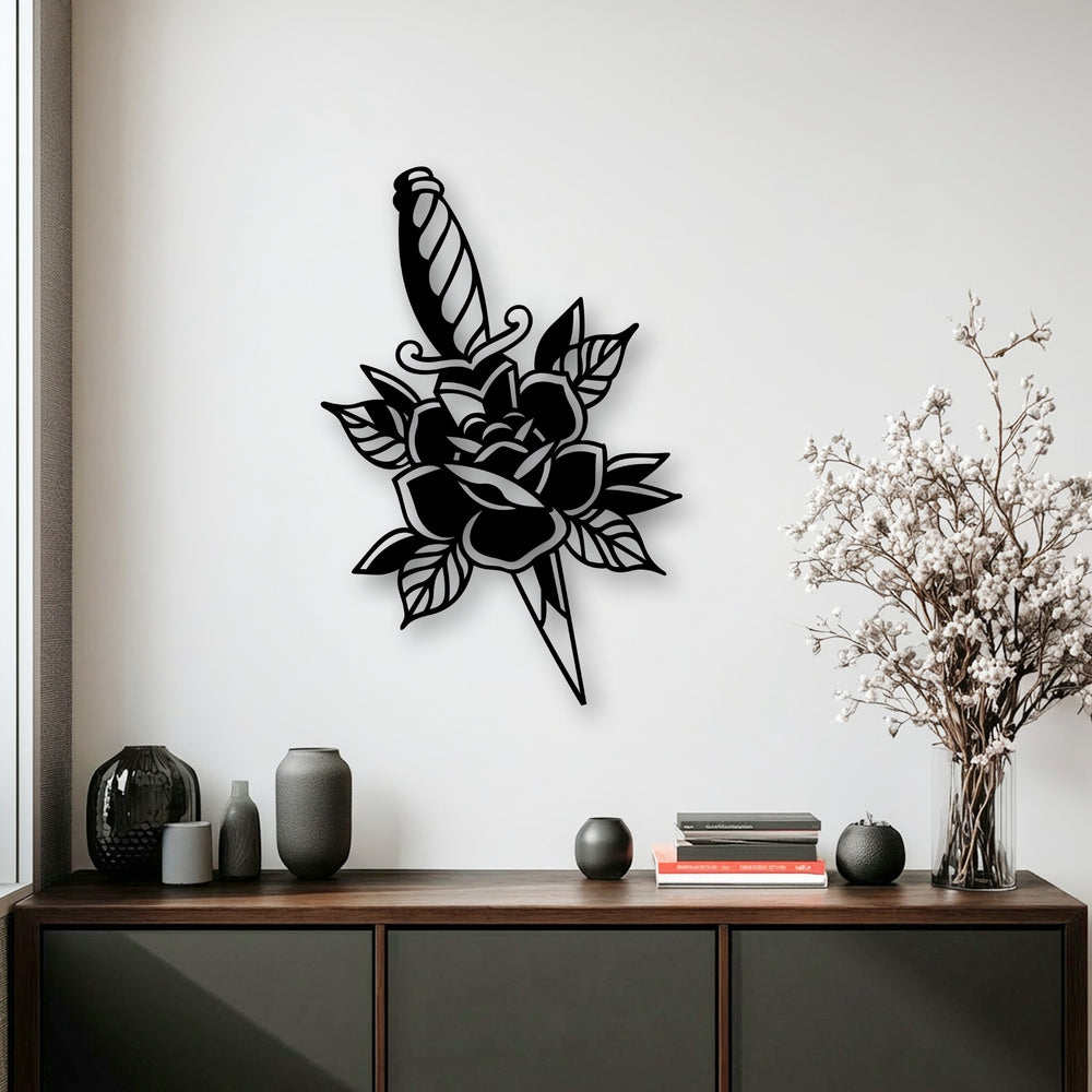 Stillness is evoked by the bold black Rose & Dagger Silhouette metal wall decor against a crisp white backdrop.