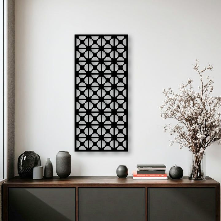 Showcasing a sleek black matte finish, this geometric circle pattern metal art for wall offers a modern minimalist panel design.