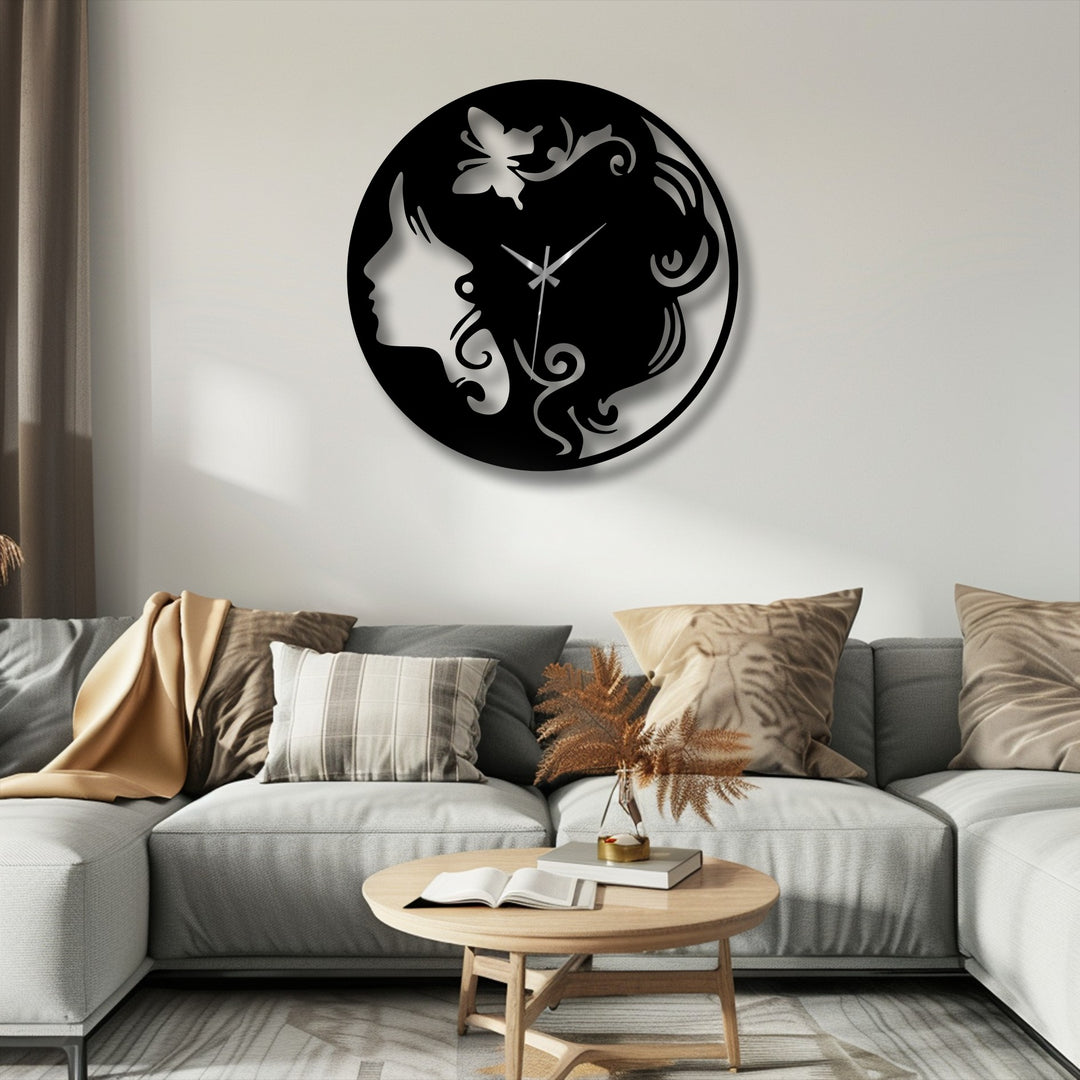 The stark color contrast of the black elegant woman silhouette metal wall clock against the light wall creates a striking unique metal wall art piece.
