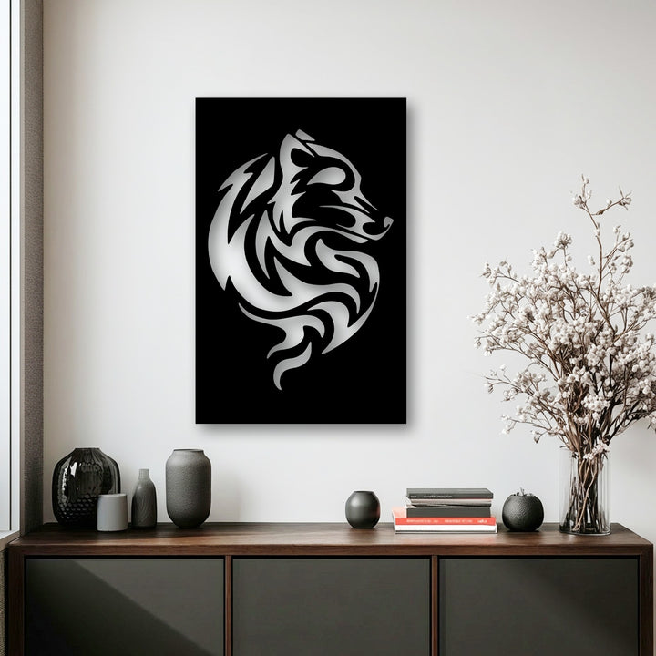 The cool color temperature of the scene emphasizes the striking silver tribal wolf swirl metal art for wall against a stark black background.