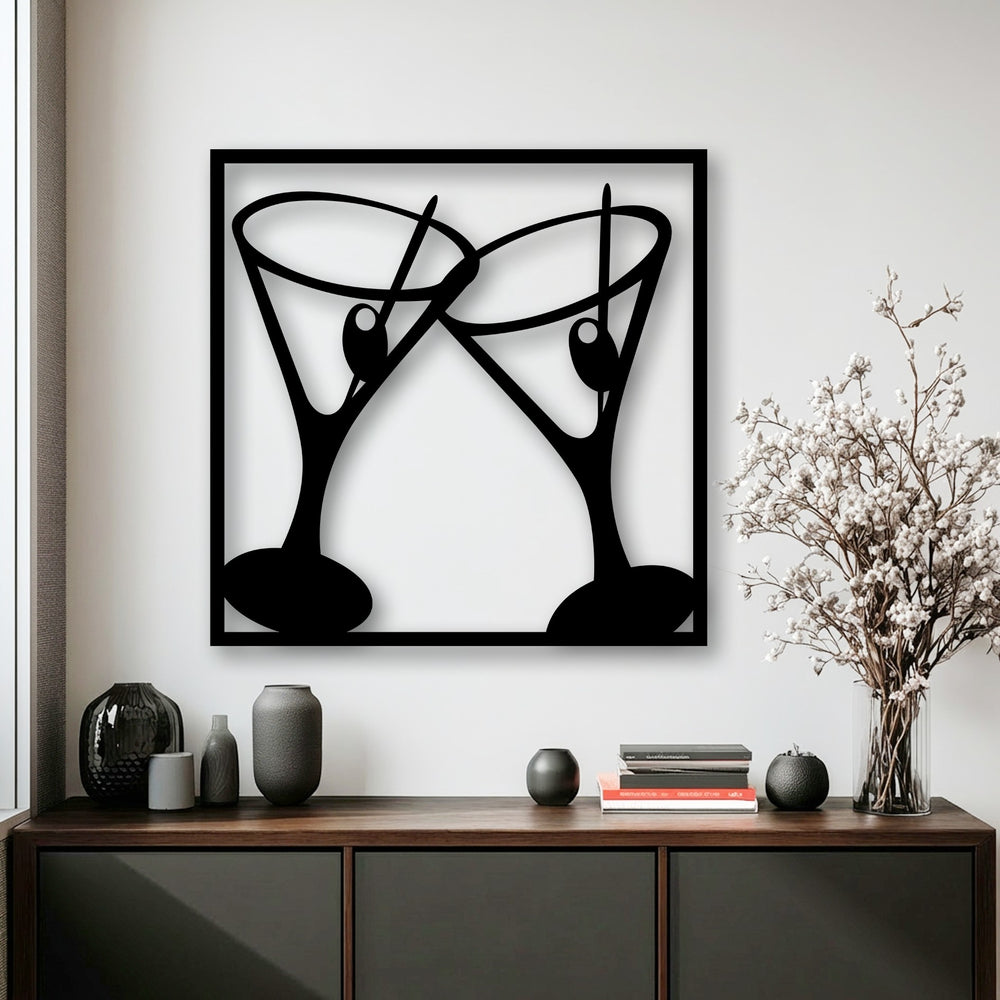 Striking color contrast between the bold black Cheers Cocktail Glasses decorative metal art and the crisp white background.
