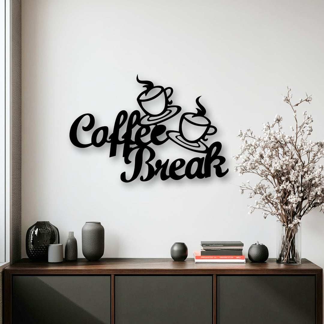 Crisp, precise edges of the black Coffee Break script metal artwork stand out, with a subtle border visible from an adjacent window frame.