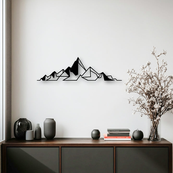 The smooth, matte surface of the geometric metal mountain line decoration wall art creates a sleek, modern visual texture.