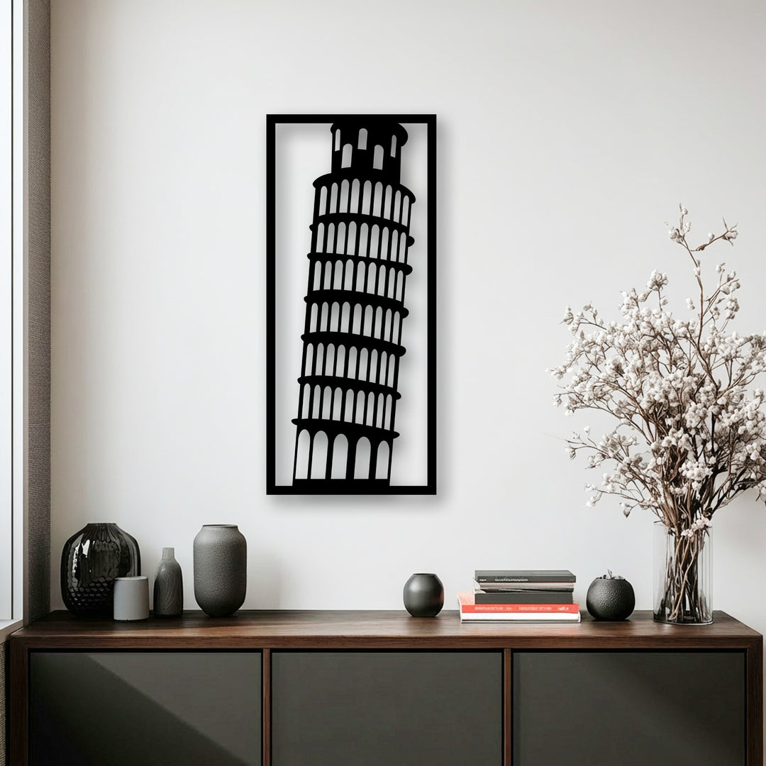 Striking color contrast is achieved by the black Leaning Tower of Pisa metal wall art against a crisp white wall, making it a bold decoration wall art piece.