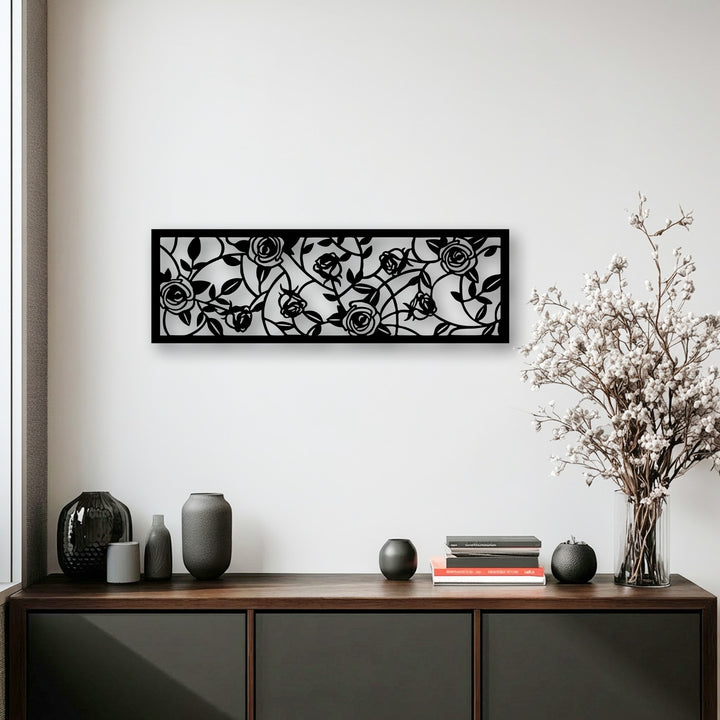 A horizontal rectangular decorative metal art piece showcasing an intricate rose garden and floral vine design.
