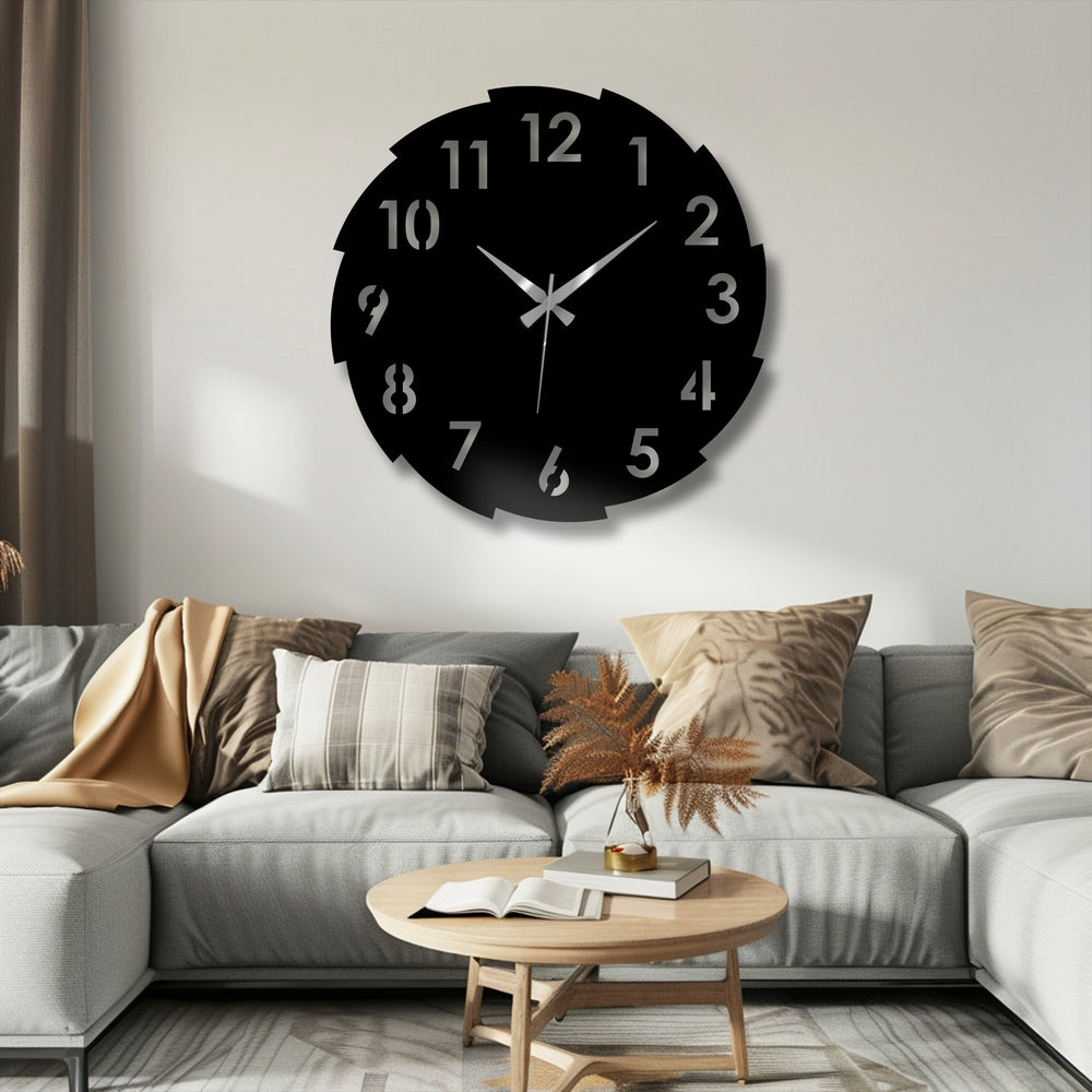 Light transitions across this segmented metal wall clock, highlighting the sleek number design and accentuating its unique decorative metal wall decor.
