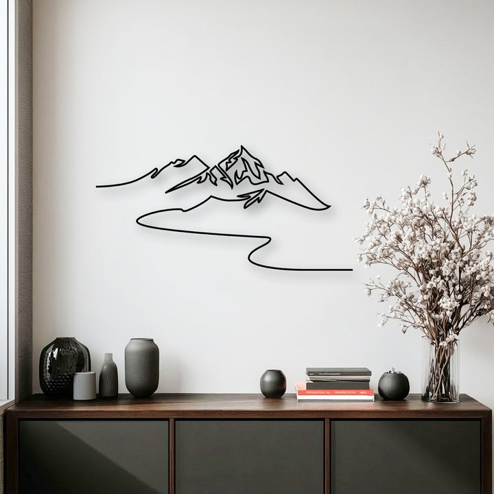 The crisp, continuous edges of the minimalist mountain line art, rendered in dark metal, form a captivating decoration wall art.