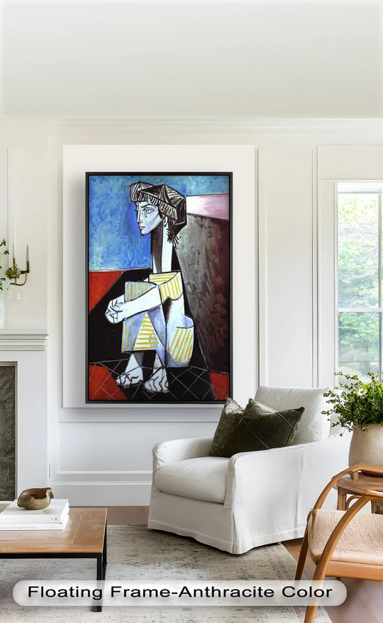 Foreground shows an oil painting reproduction print of 'Seated Boy with Striped Garment' by Picasso, showcasing the unique cubist style in vivid color and bold lines.