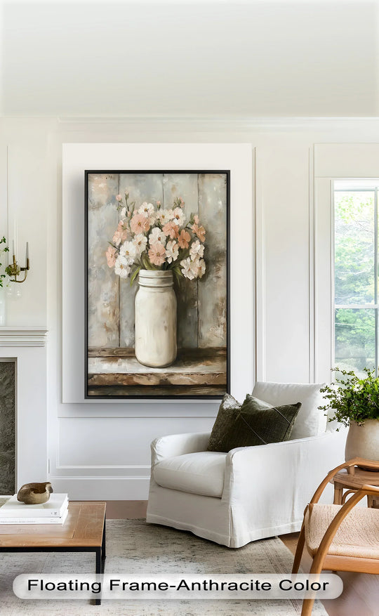 Layering textures create depth in this blush and cream blooms oil painting wall art depicting soft pink and ivory flowers in a rustic mason jar.