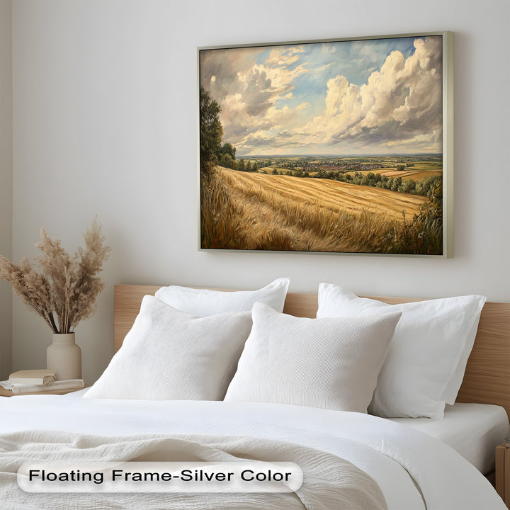Pastoral scene of rolling fields and distant village beneath a glowing sky.
