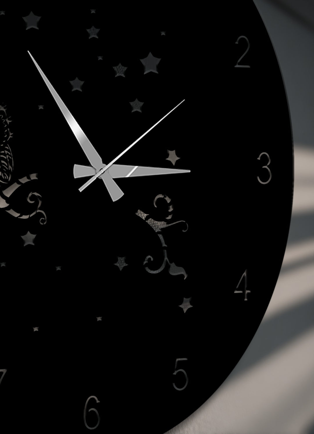 Tilted, circular unique metal wall art featuring an owl night wall clock with a starry sky design, partially displaying numbers 2 through 6.