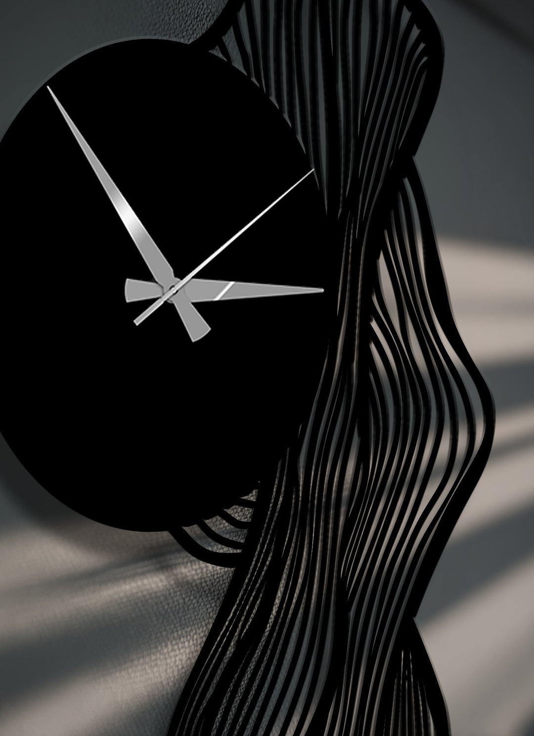 Predominantly black, this elegant flowing abstract leaf metal wall clock showcases captivating layered metal art for wall.