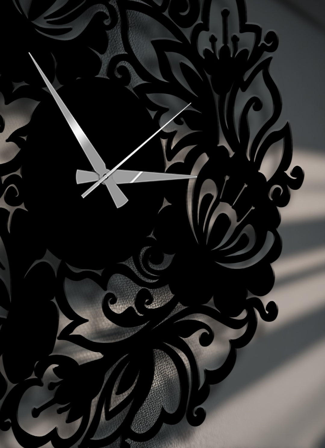 The striking negative space surrounding the ornate floral wreath metal art for wall clock highlights its elegant botanical design and delicate silhouette.