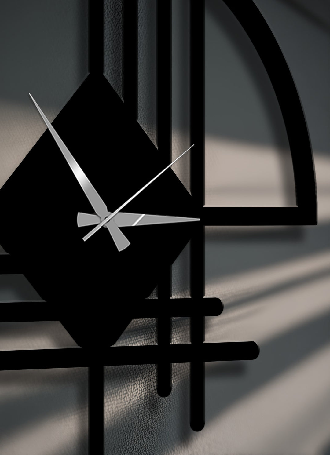 The abstract metal artwork clock reveals striking depth through its layered geometric lines and the intricate shadows cast across its dark surface.