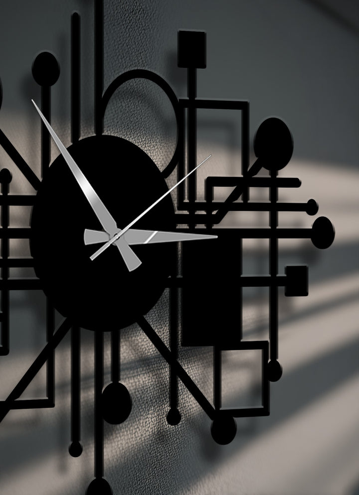 The striking decorative metal art clock features a complex network of abstract black shapes, subtly resembling organic forms with soft shadows.